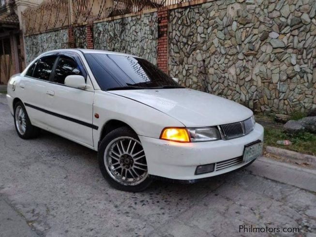 Mitsubishi lancer 2001 года